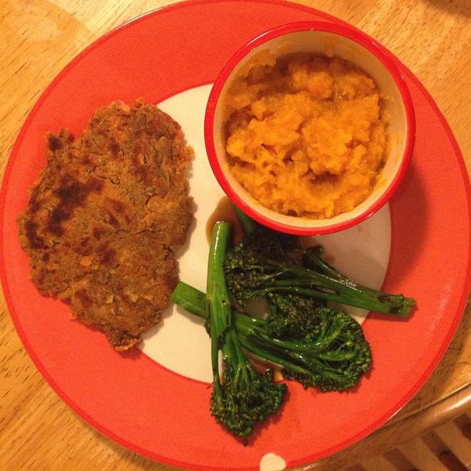 A chickpea cutlet with some mashed butternut squash and baby broccoli splashed with vegan worcestershire sauce.